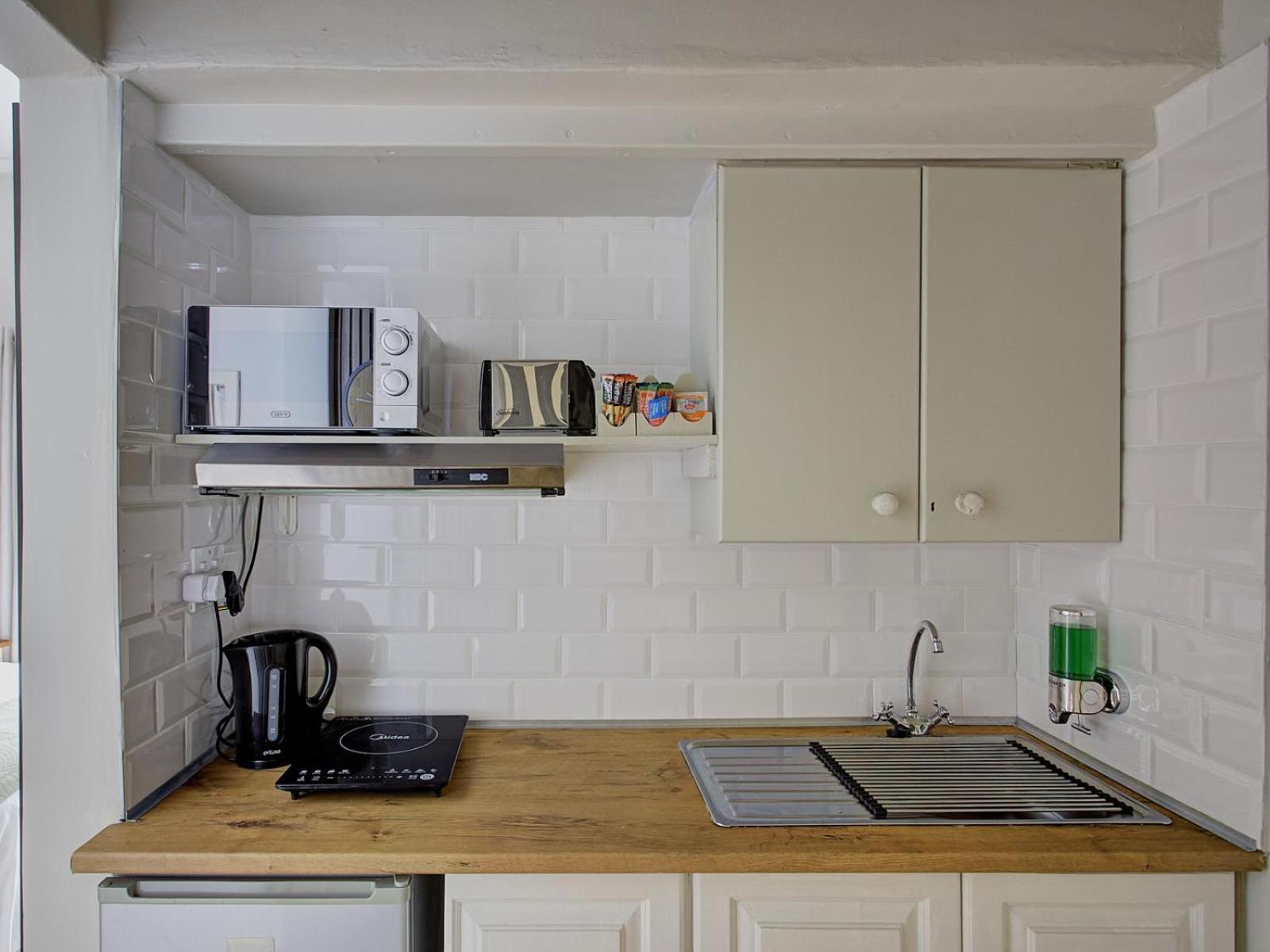 Leeuwenzee Guesthouse Cape Town Rom bilde
